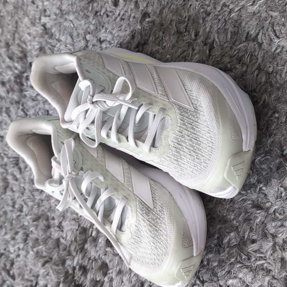 adidas Women's White Athletic Running Shoes with Subtle Yellow Accent
